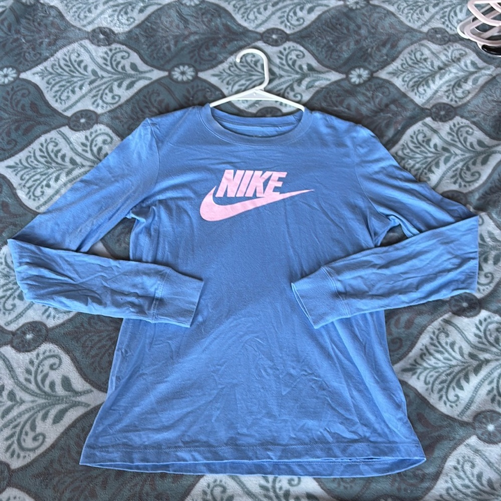 Used XS baby blue Nike long sleeve shirt, with baby pink letters